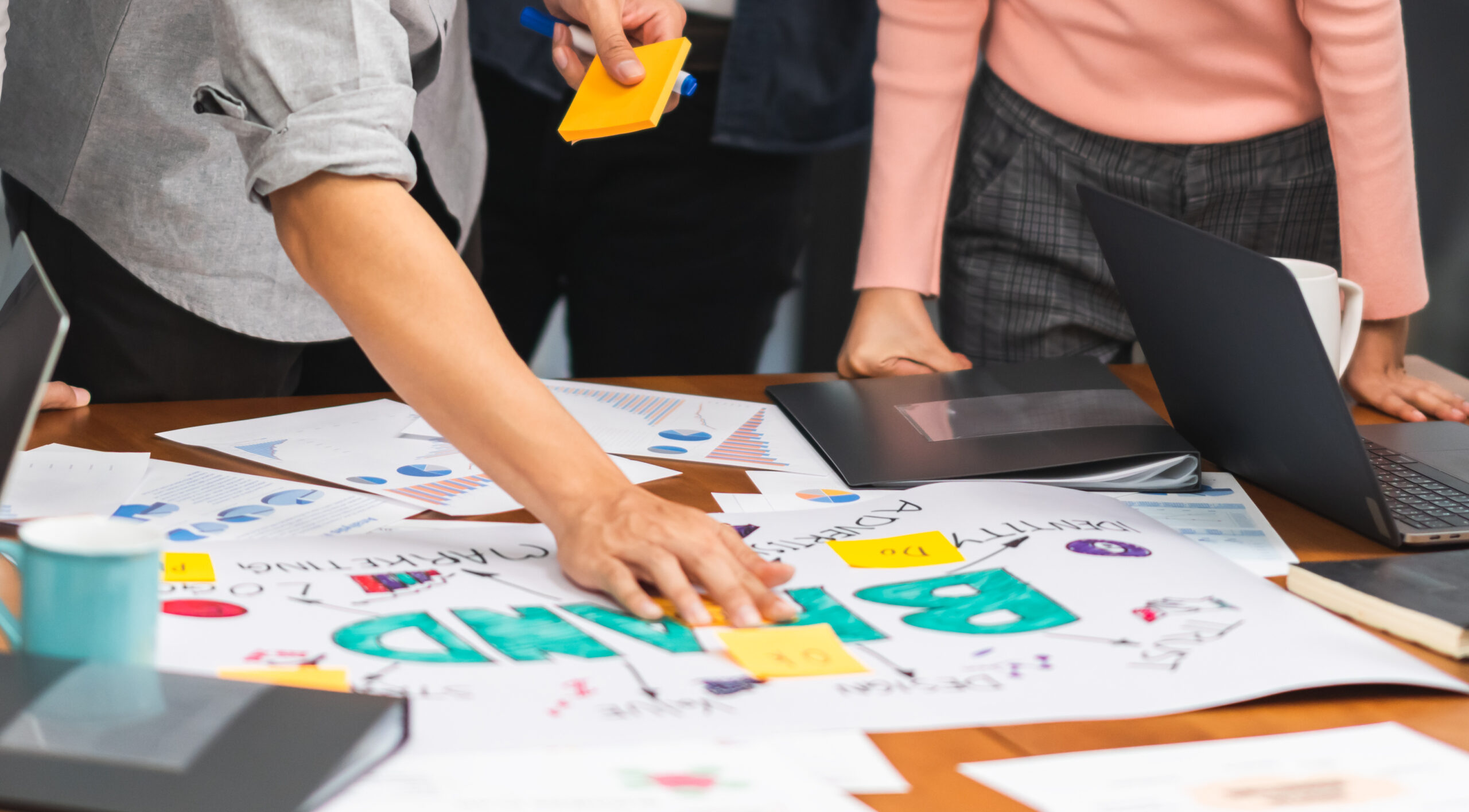 marketers brainstorming brand guidelines